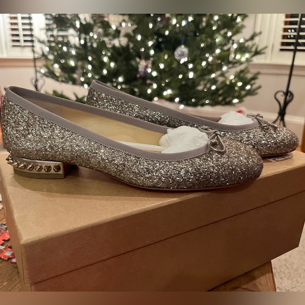 NEVER WORN: Silver Christian Louboutin Ballet Flats.